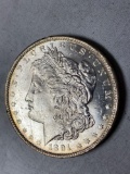 1891-O Morgan dollar, AU.