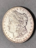 1892-O Morgan dollar, AU.