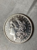 1894-O Morgan dollar, AU.