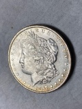 1897 Morgan dollar, AU.