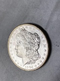 1904-O Morgan dollar, AU.