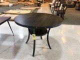 Round wooden pub table