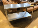Metal industrial table damaged 48 inches by 20 inches