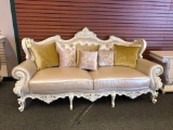 Ornate silver/cream leather sofa