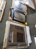 Three assorted framed mirrors