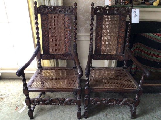 Two Carved Cane Bottom Arm Chairs