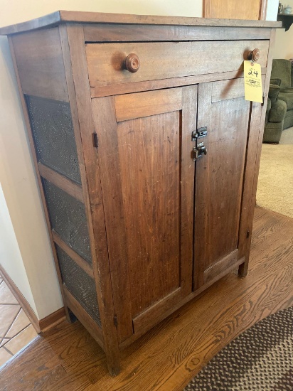 Antique pie safe w/ decorated pierced tin sides, 50" tall x 38" wide.