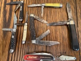 (9) pocket knives. One not pictured.