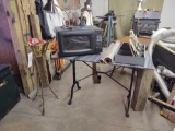 Cast leg Table w/ Sharp Microwave, Plant Stand , organizer files and Wrapping Paper