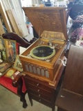 Silverstone tabletop phonograph with non matching music cabinet base