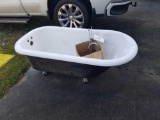 Cast iron bath tub and fixtures