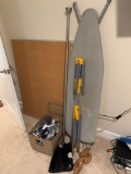 Rowenta clothes iron, shoe stretcher, cork board, curtain rod, drying rack