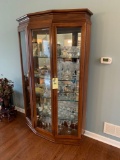 Beveled glass mirrored back curio cabinet