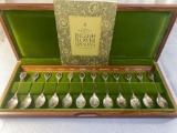 Set of (12) sterling English flower spoons. Each spoon weighs 8/10ths oz.