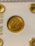1906 Uncirculated $2 1/2 U. S. gold coin.