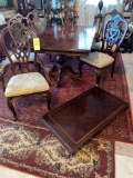 Chippendale style claw footed dining table w/ extra leaf & (6) chairs.