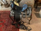 Wood Framed Horse Saddle with Ornate Metal Pieces