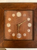Battery operated clock w/ 1964 silver coins, $2.30 face value.