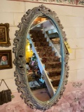 Ornate plastic framed wall mirror, 49