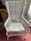 Old wicker arm chair.