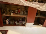 Contents of two shelves. Figurines, etc.