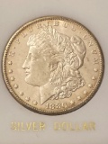 1880-CC Morgan silver dollar, AU.