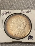 1900 Morgan silver dollar, AU.