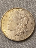 1921 Morgan silver dollar, AU.