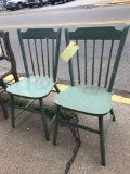 Two green ant. chairs