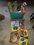 Tote of new saw blades and hardware