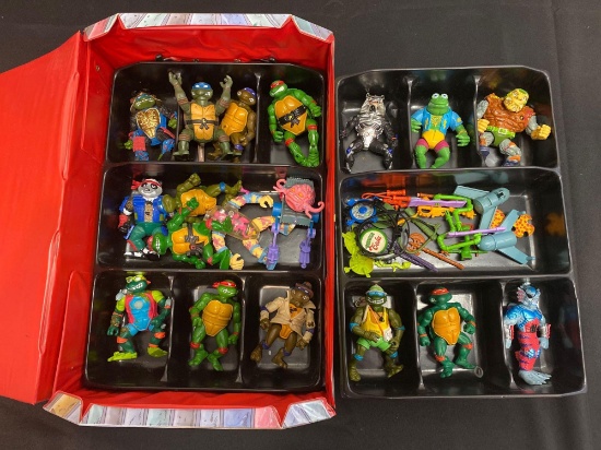 Teenage Mutant Ninja Turtles action figures in case TMNT