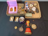 2 boxes of miniatures and perfume bottles, covered dresser dish, cast-iron skillet