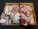 2 boxes costume jewelry, keychains, newer items