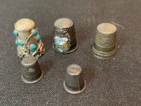 5 thimbles, some marked sterling