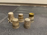 5 thimbles some are Sterling Silver