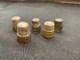 5 thimbles, sterling marked on some