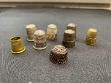 8 thimbles some sterling silver