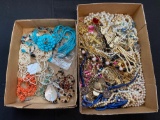 2 boxes of costume jewelry, mostly necklaces