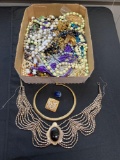 1 box of assorted costume jewelry, necklaces and more. Some gold filled