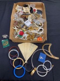 1 box full of assorted jewelry, brooches, necklaces, bangles, bracelets and more!