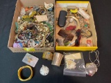 2 boxes of costume jewelry, necklaces, bracelets, brooches, and more