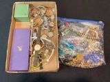 Box and bag of assorted costume jewelry, watches, necklaces and more