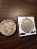 1928s and 1934 peace dollars. Bid x 2
