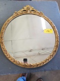Round gold frame mirror