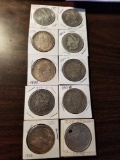 Morgan silver dollars. 1879-1900o. 1879 is drilled. Bid x 10
