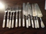 Forks and knives, marked sterling on the handles