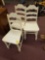 3 white painted chairs