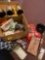 Box of miscellaneous items, Harley Davidson lock, net, mugs, CDs, umbrellas, Cleveland Browns