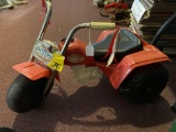 Small plastic kids ride on, about 12 inches tall