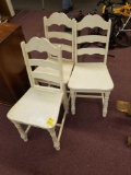 3 white painted chairs